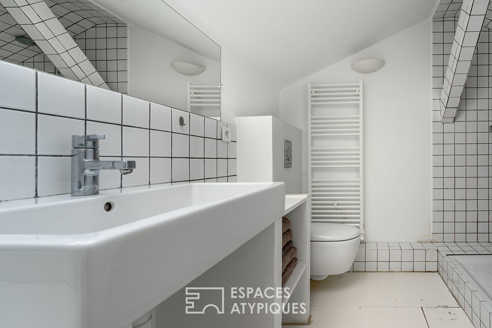Duplex traversant au dernier étage
