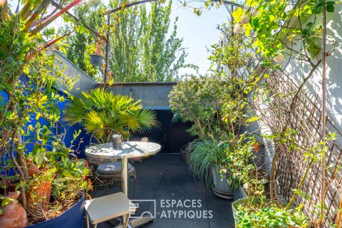 Duplex en dernier étage avec terrasse dans une ancienne usine