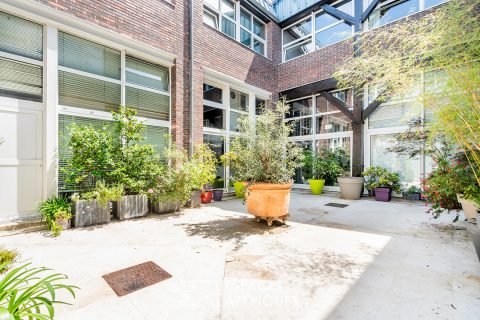 Triplex with shared terrace in a former coaching inn