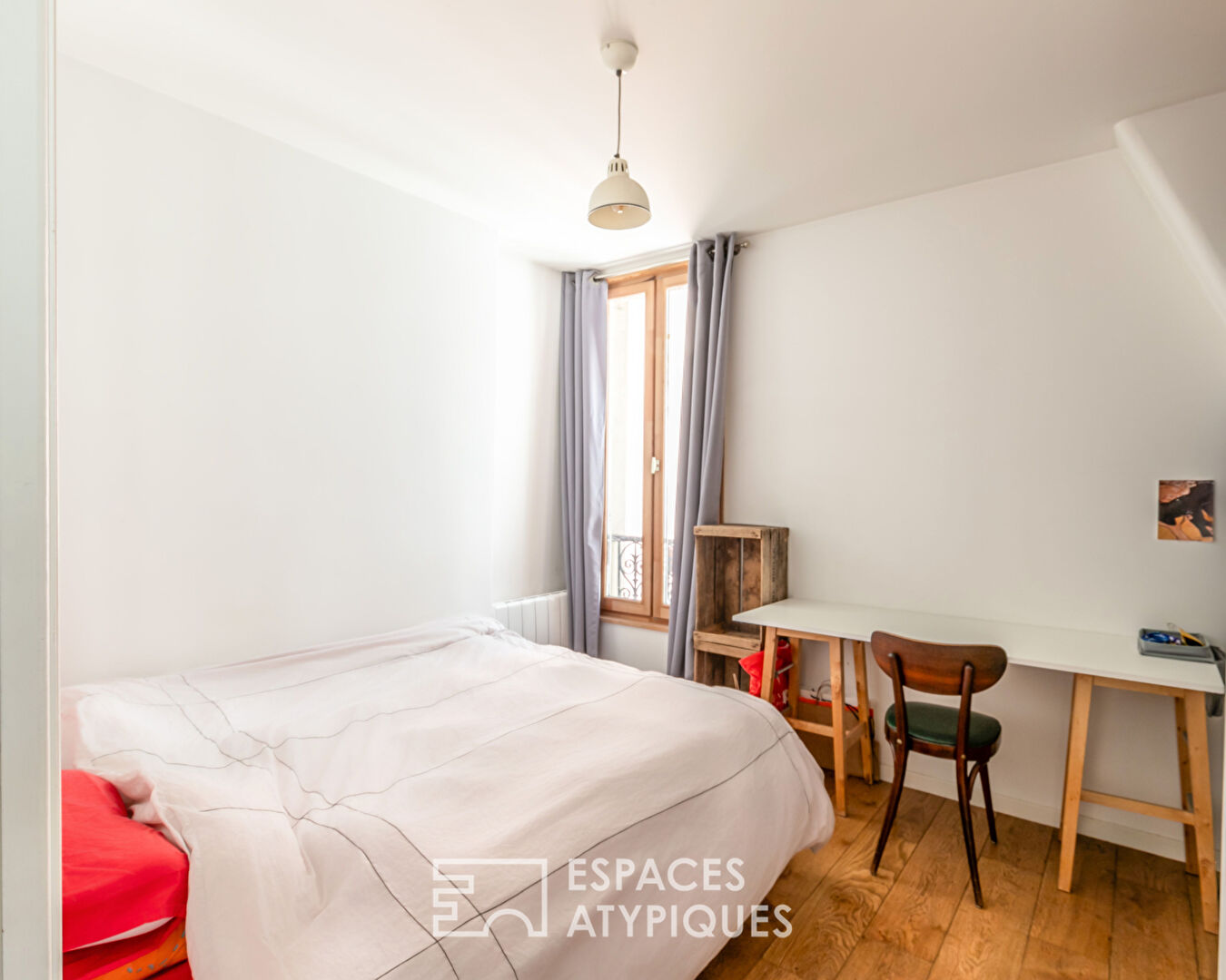 Duplex sous les toits refait par architecte
