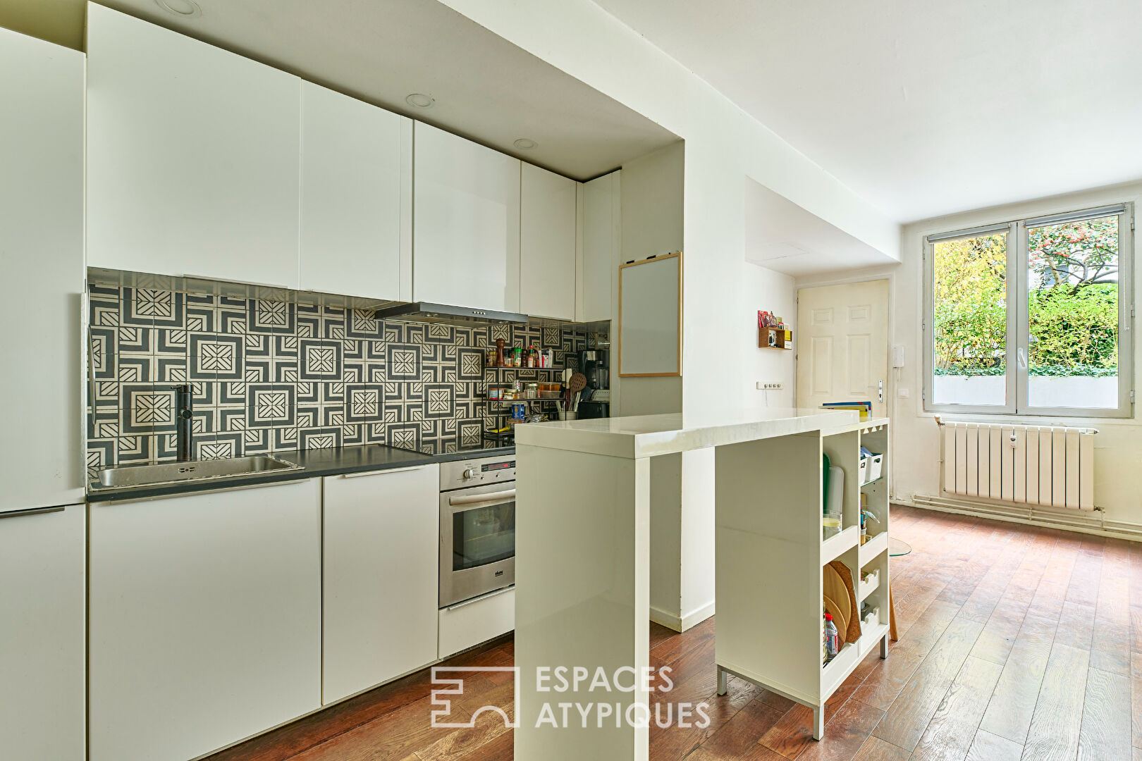 Ancienne imprimerie transformée en loft sur jardin