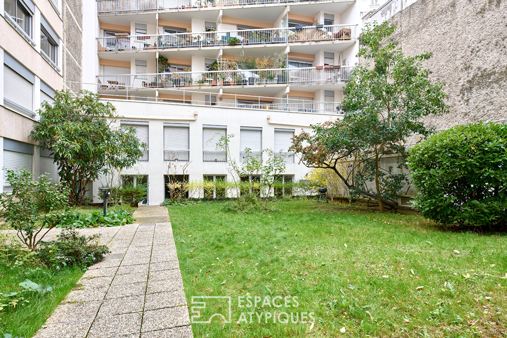 Ancienne imprimerie transformée en loft sur jardin