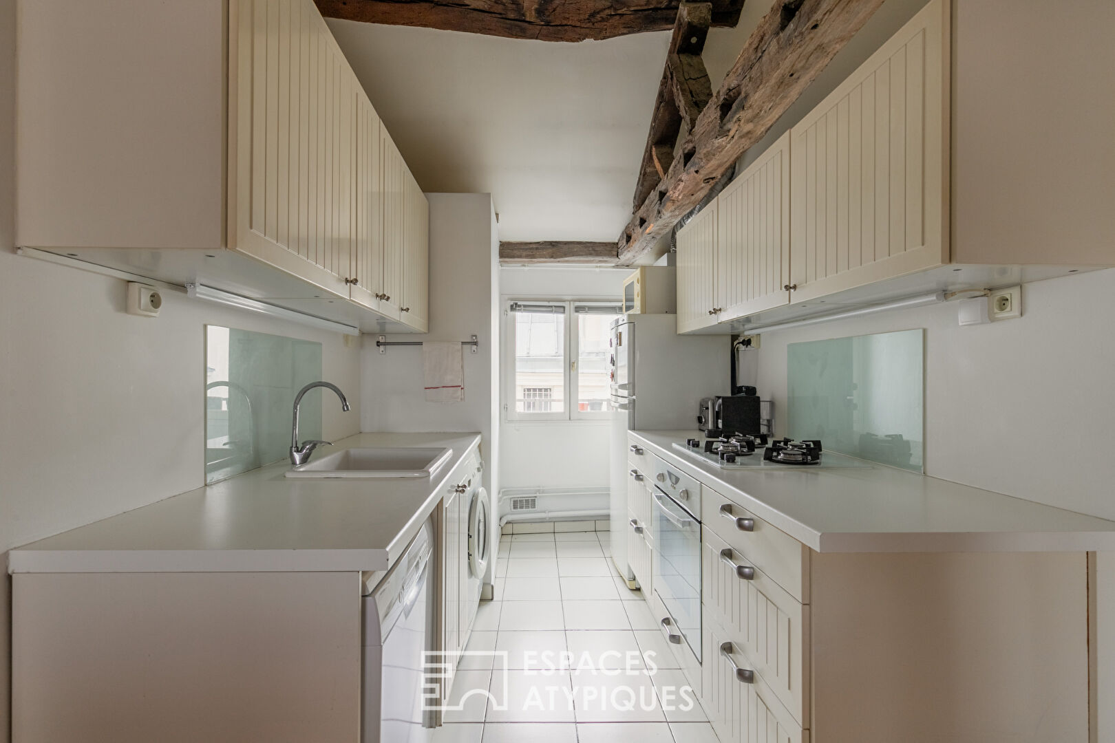 Duplex en dernier étage sous les toits au cœur du Haut Marais