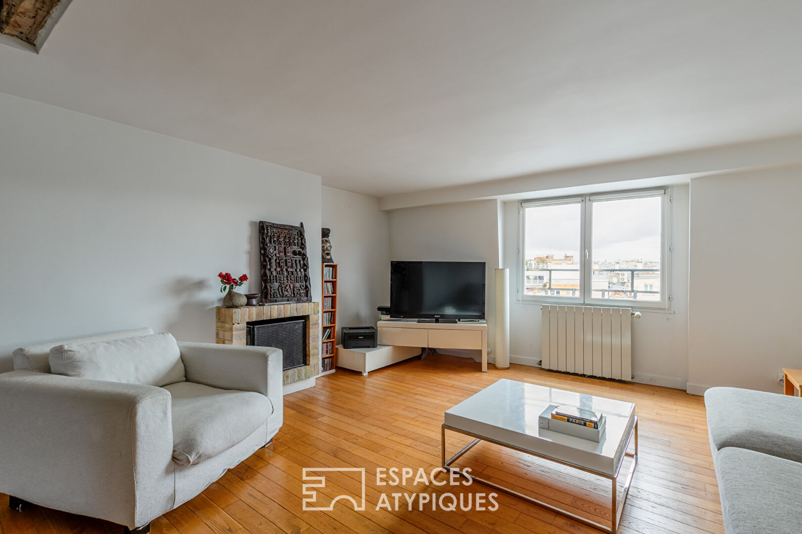 Duplex en dernier étage sous les toits au cœur du Haut Marais
