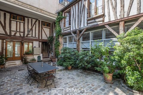 Loft on paved courtyard