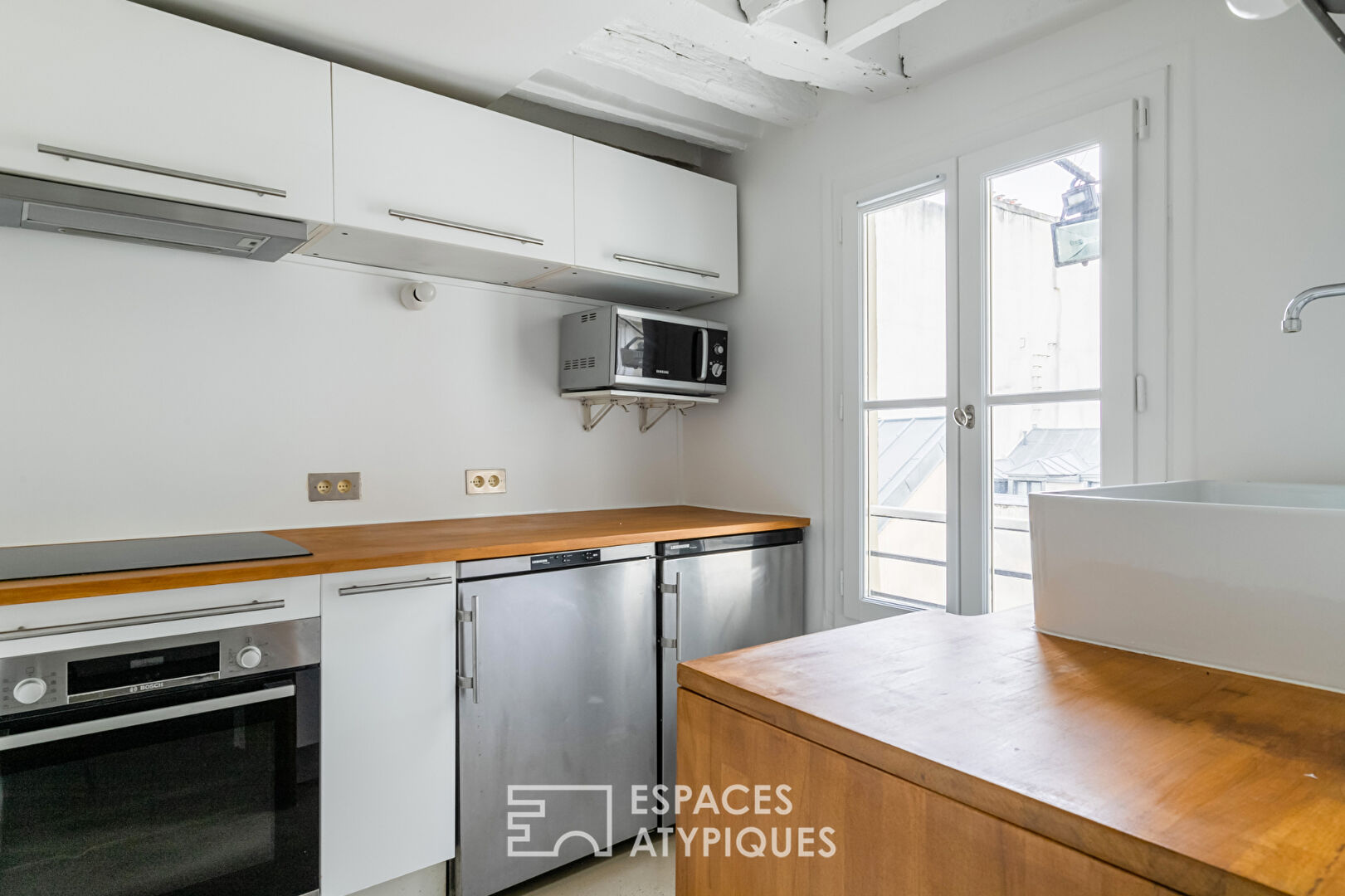 Duplex en dernier étage avec terrasse repensé par architecte