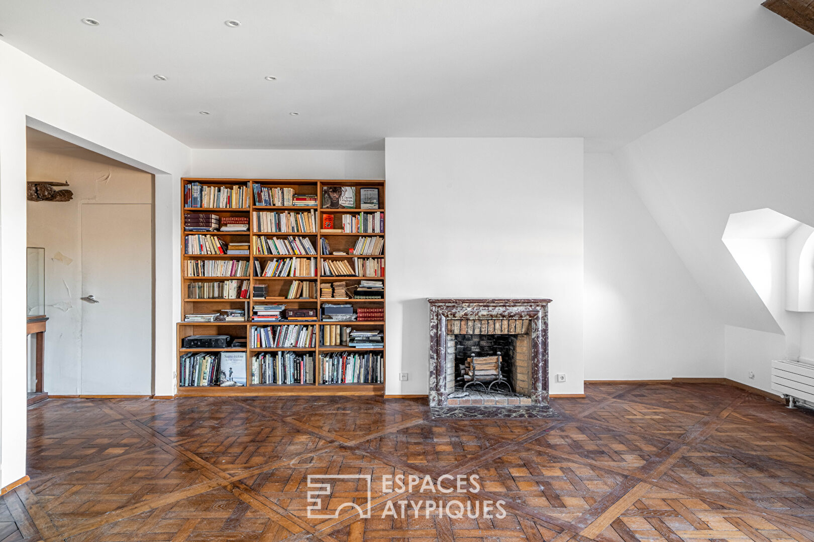 Un duplex à réinventer avec vue sur l’emblématique Place des Vosges