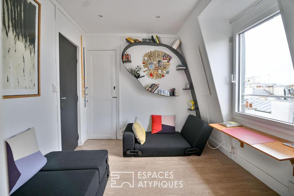 Chambre de bonne dernier étage avec vue sur la tour eiffel