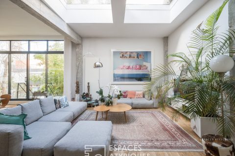 Loft avec terrasse dans d’anciens ateliers