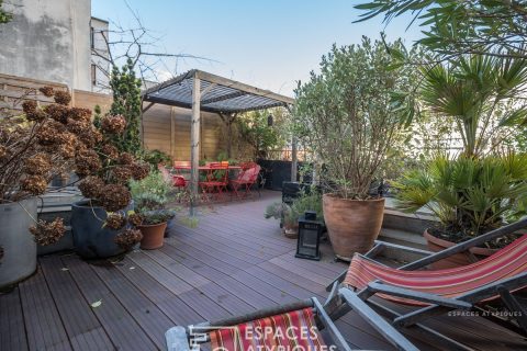 Loft avec terrasse dans d’anciens ateliers