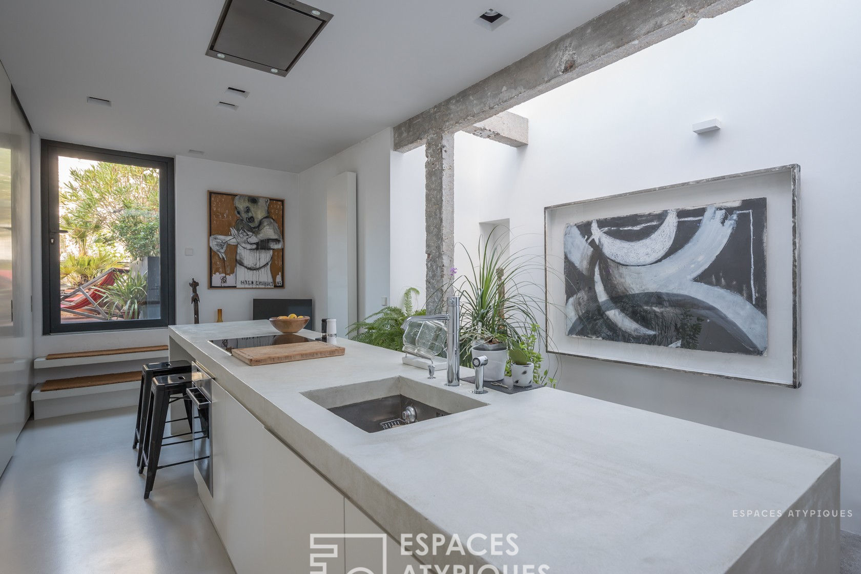 Loft avec terrasse dans d’anciens ateliers