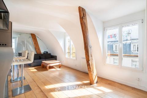 Appartement sous les toits de Paris avec vue sur la colonne de la Bastille