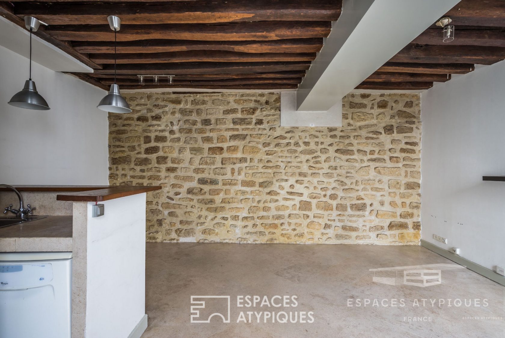 Flat with exposed stones and beams in le Marais