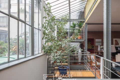 Loft avec verrière et structure Eiffel