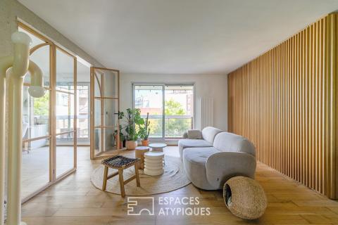 Architect-designed apartment bathed in light with balconies