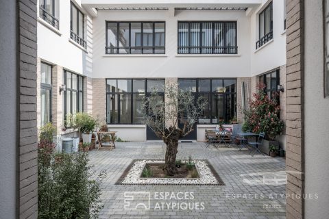 Triplex avec terrasse dans une ancienne imprimerie