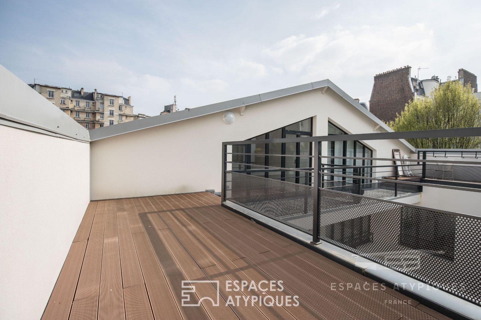 Triplex avec terrasse dans une ancienne imprimerie