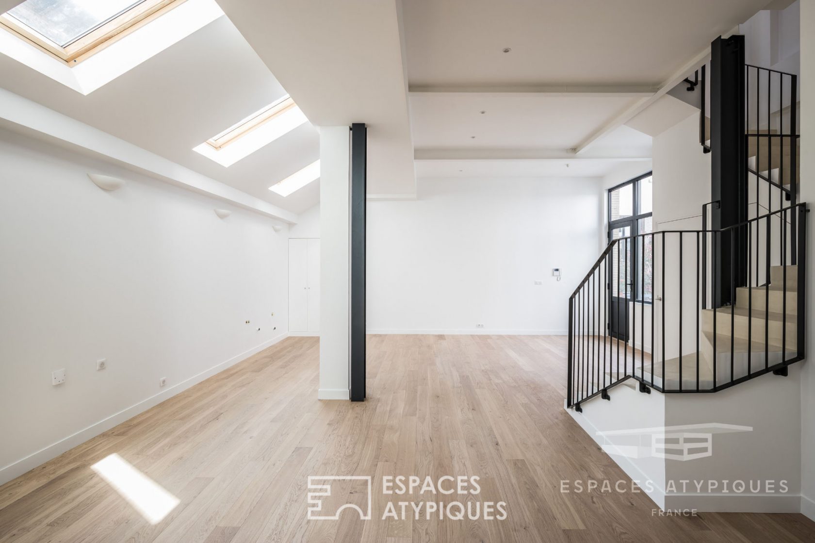 Triplex avec terrasse dans une ancienne imprimerie