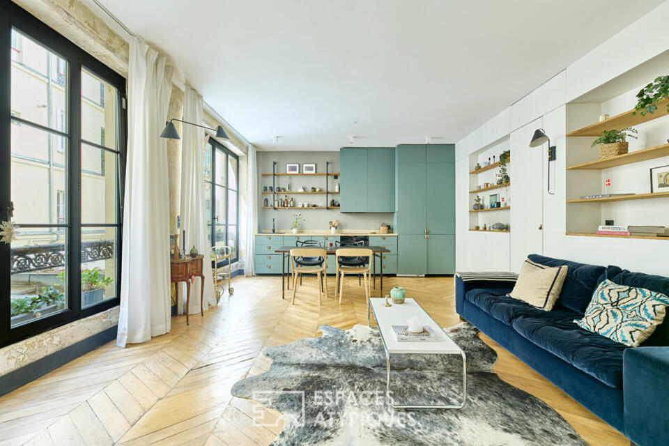 Appartement esprit atelier sur cour pavée au coeur du 10ème.