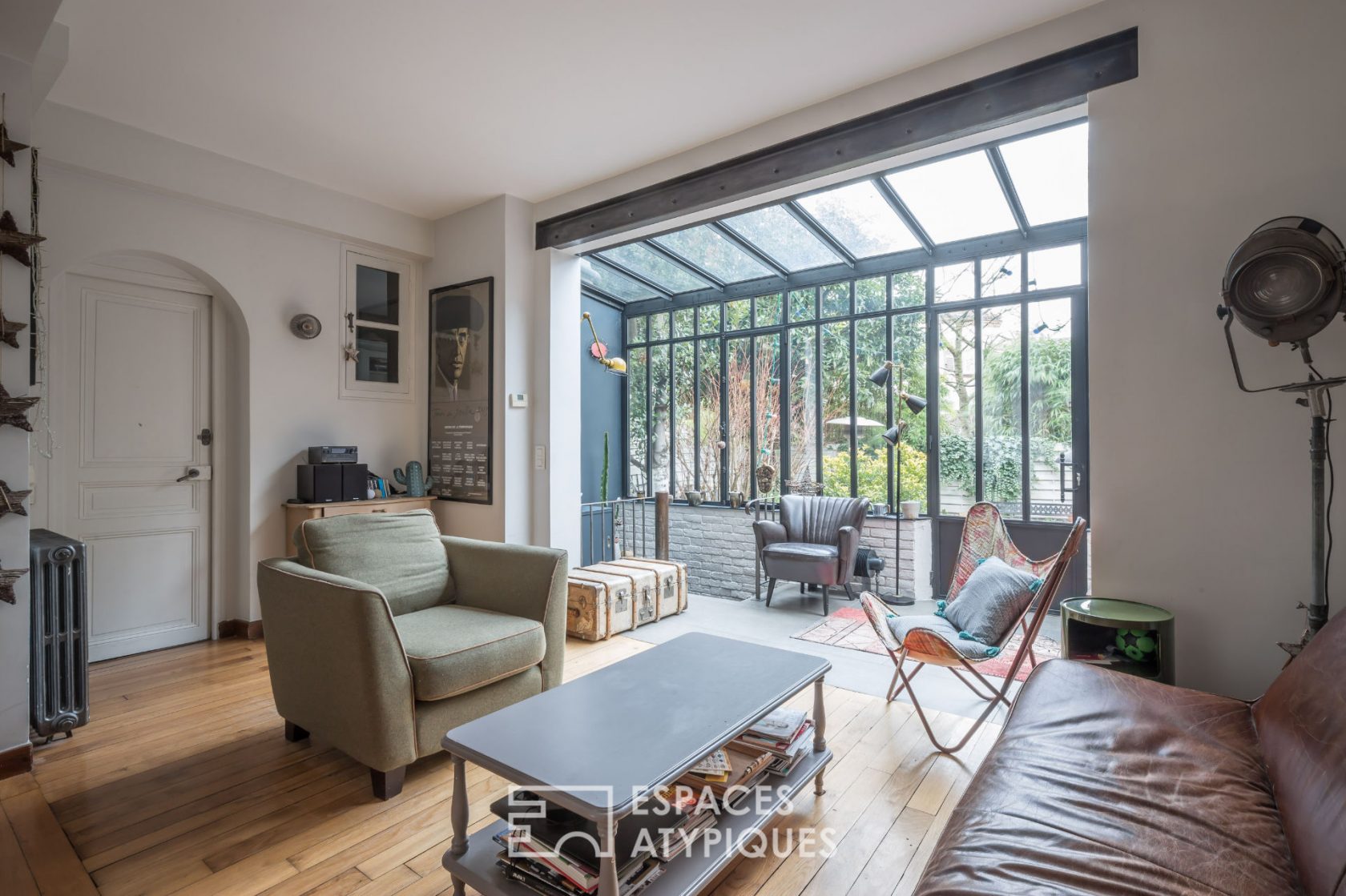 Maison avec verrière et jardin