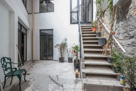 Loft with courtyard in former carpentry