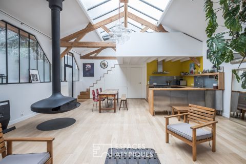Glass roof loft with garden