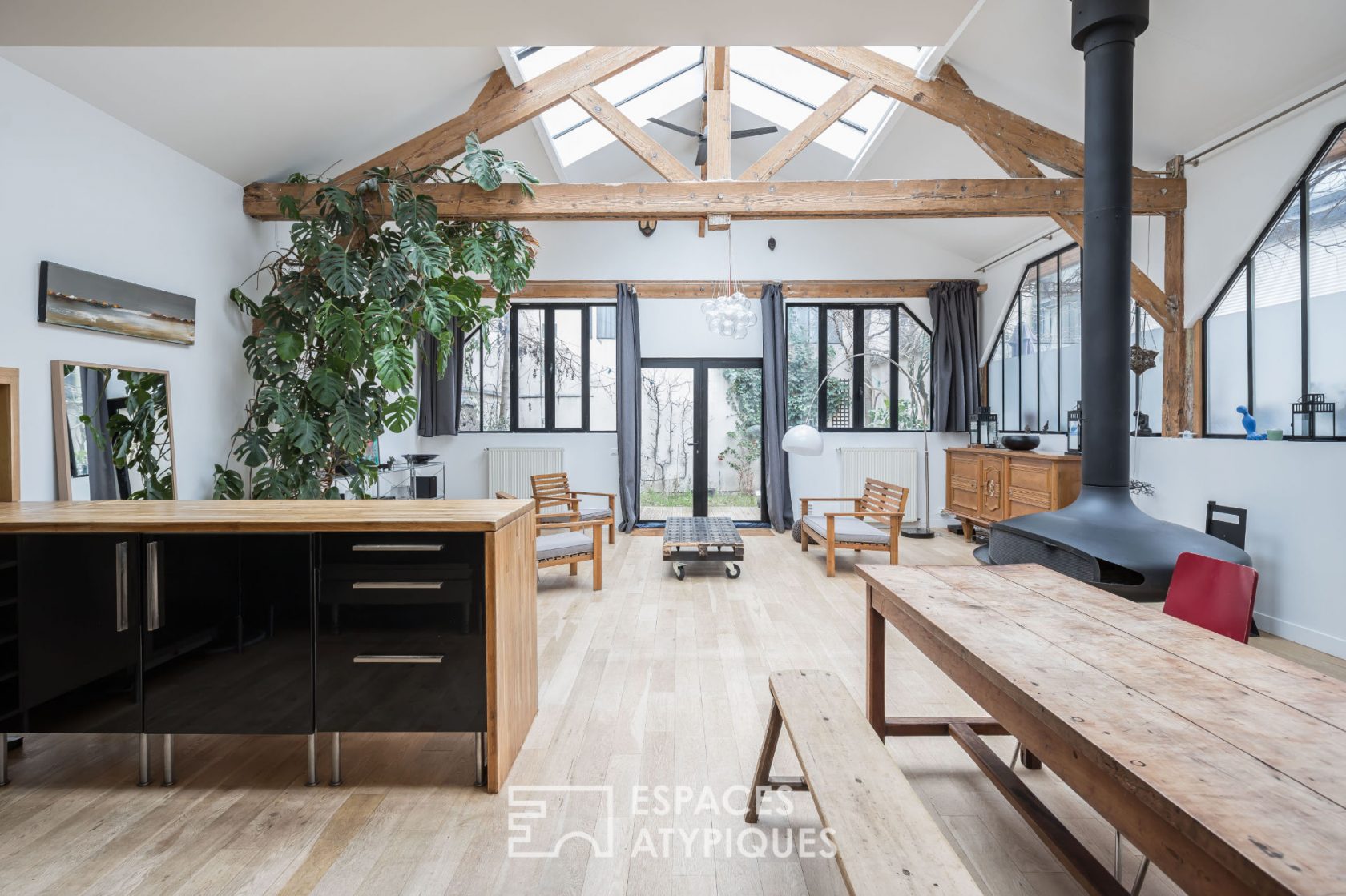Glass roof loft with garden