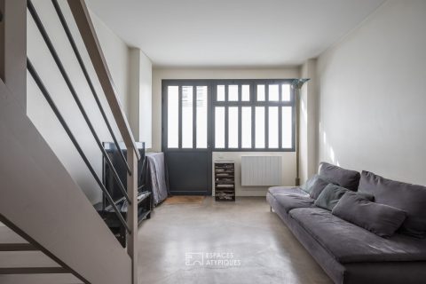 Former garage converted into a triplex house