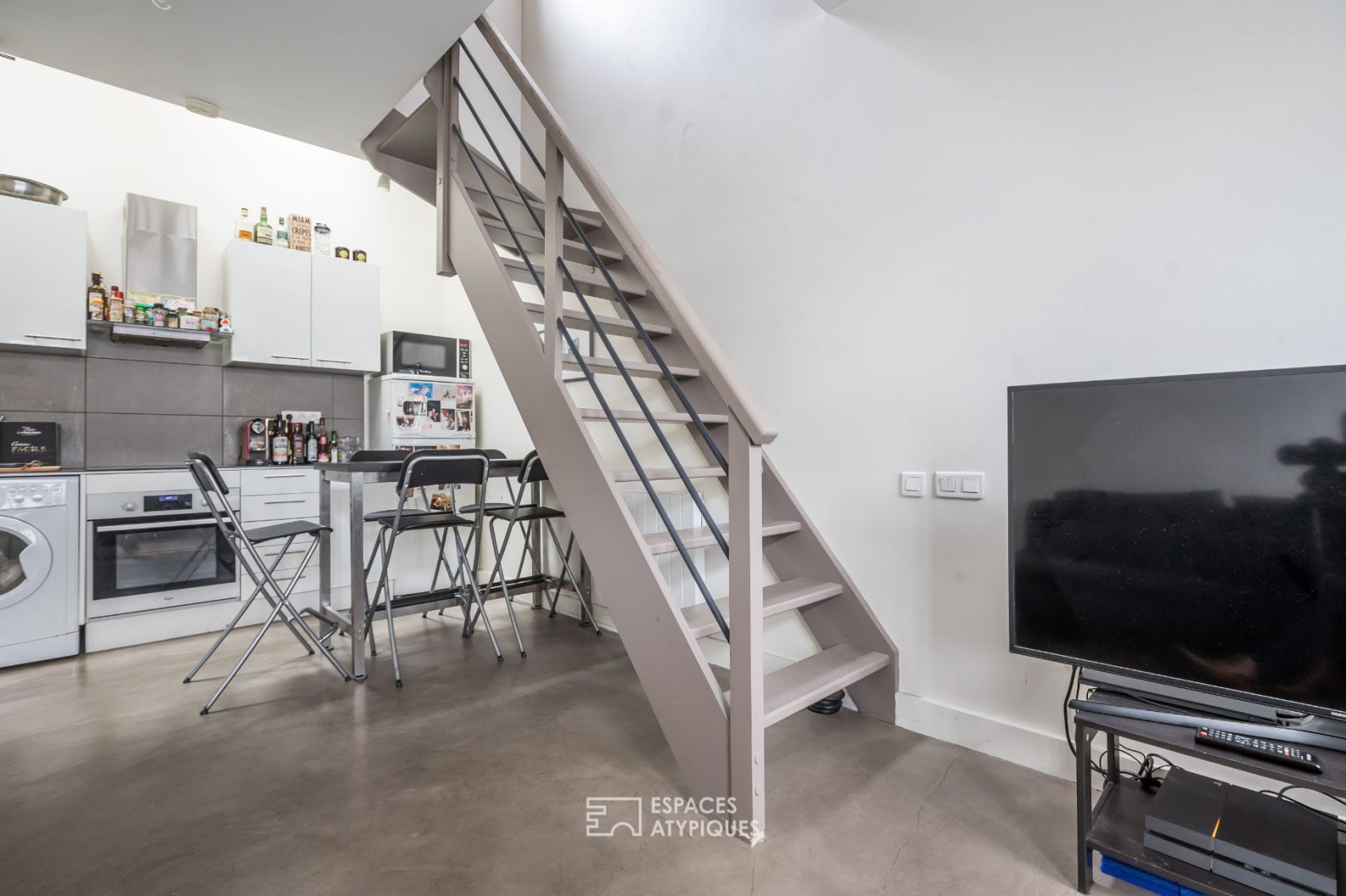 Former garage converted into a triplex house
