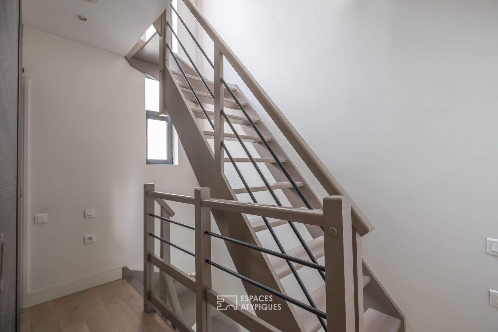 Former garage converted into a triplex house