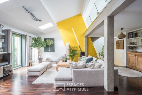 Maison contemporaine avec terrasses dans une ancienne usine