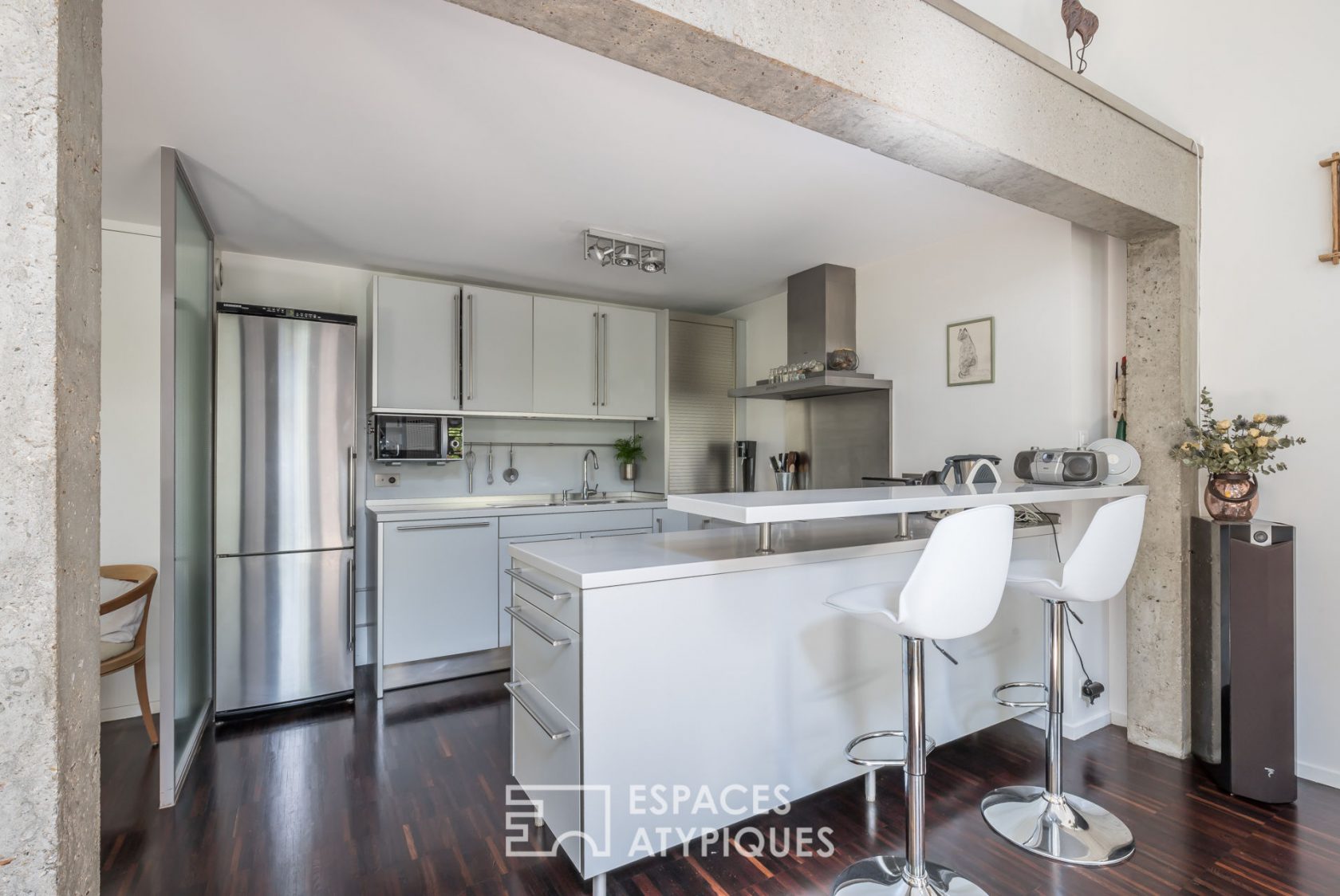 Maison contemporaine avec terrasses dans une ancienne usine