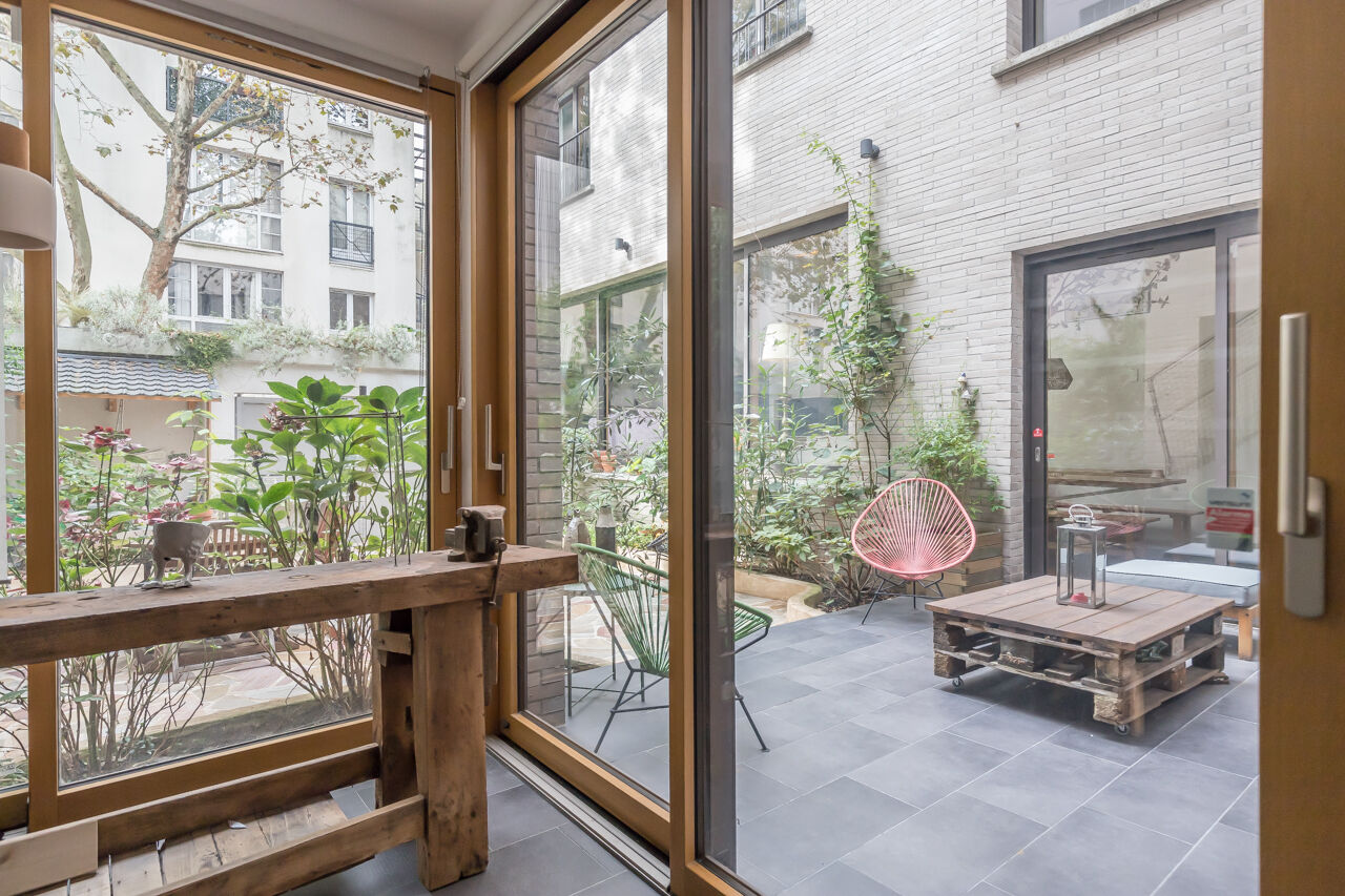 Maison d’architecte avec cour et terrasses