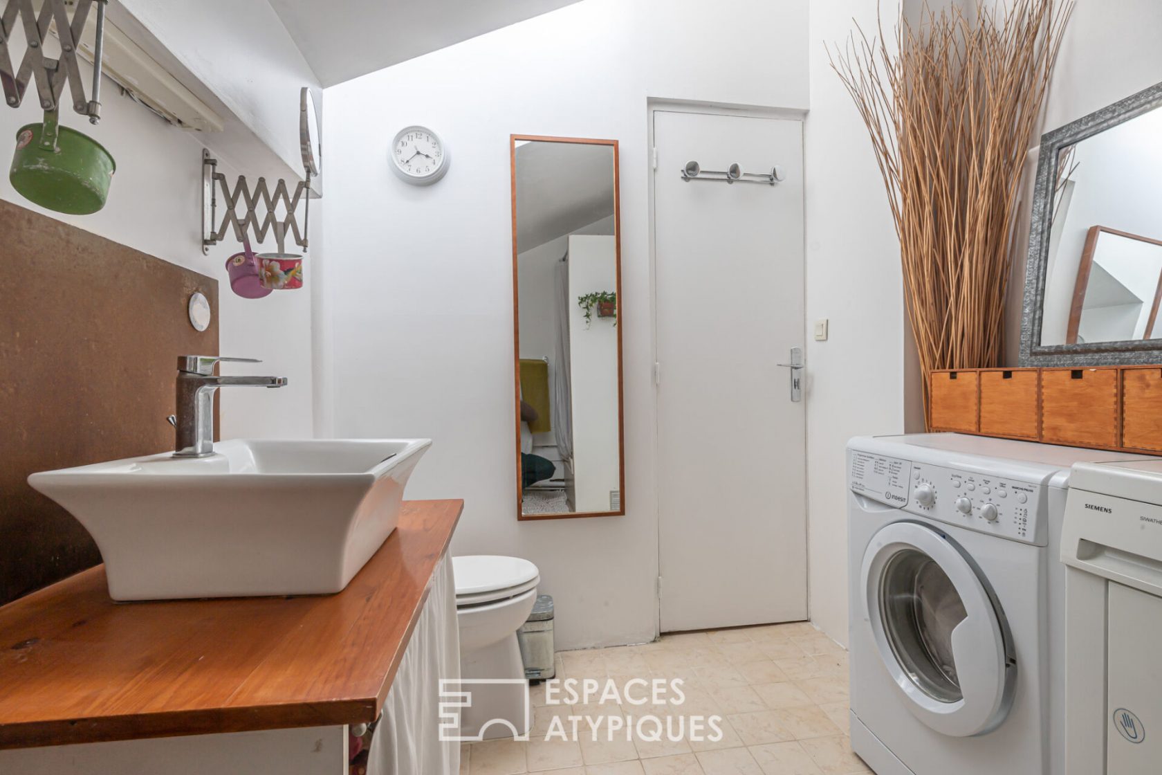 Duplex familial dans une ancienne fabrique de landaus