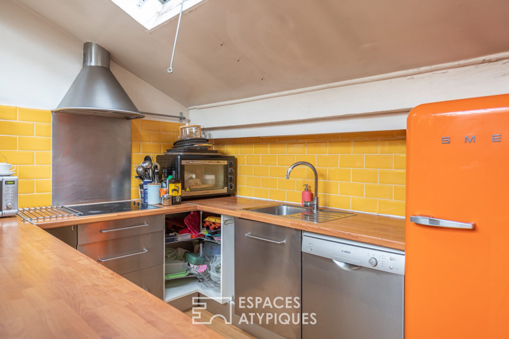 Duplex familial dans une ancienne fabrique de landaus