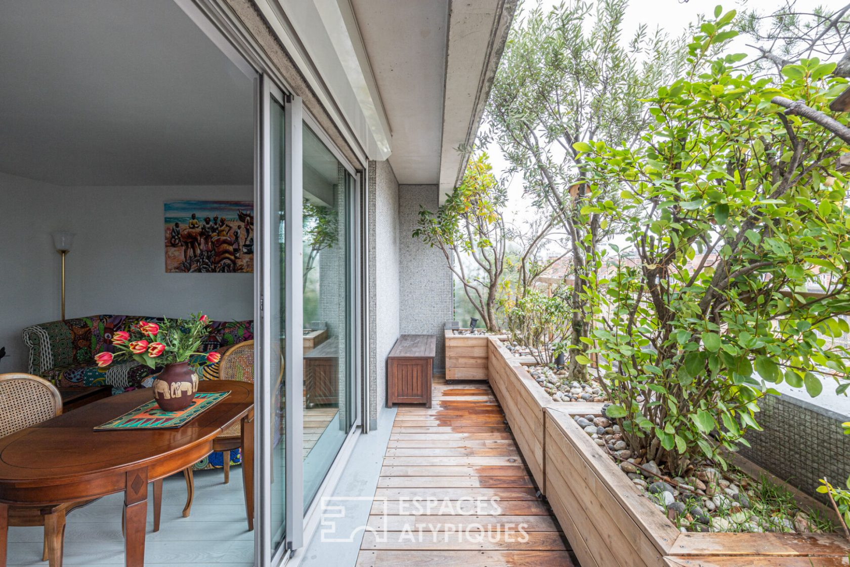 Top floor with tree-lined terraces