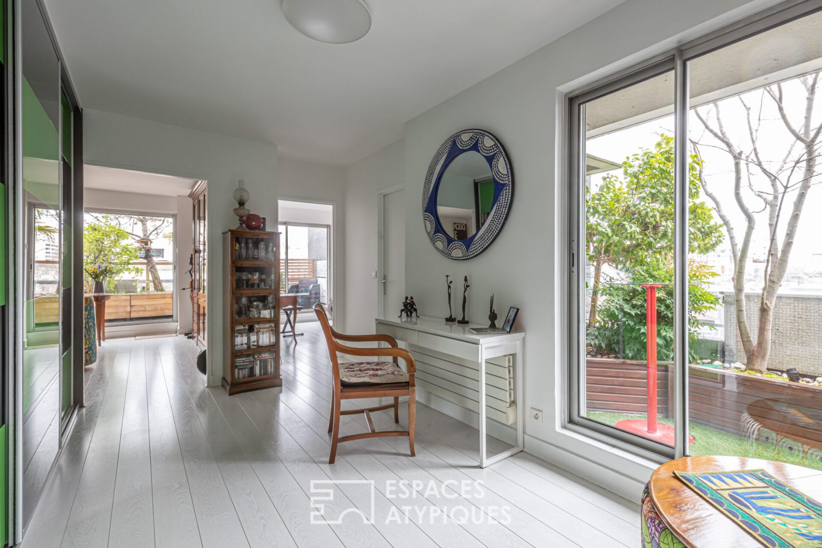 Top floor with tree-lined terraces
