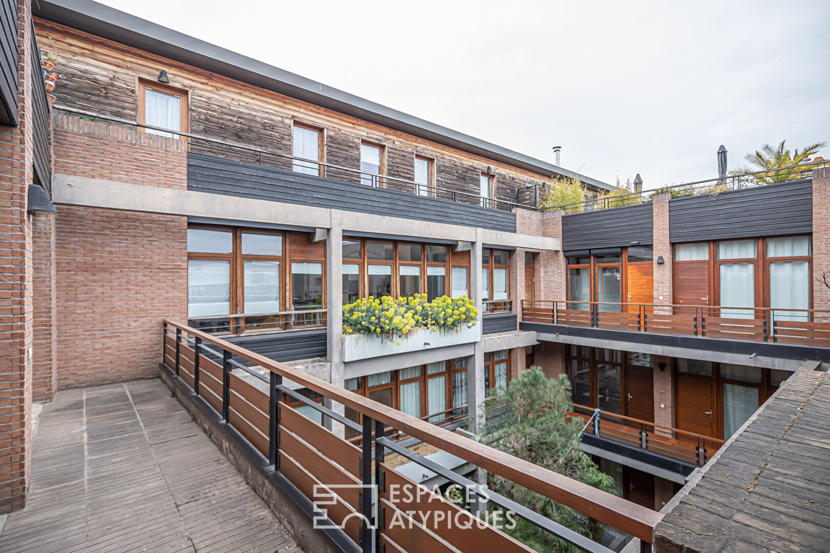 Duplex avec terrasse dans ancienne imprimerie