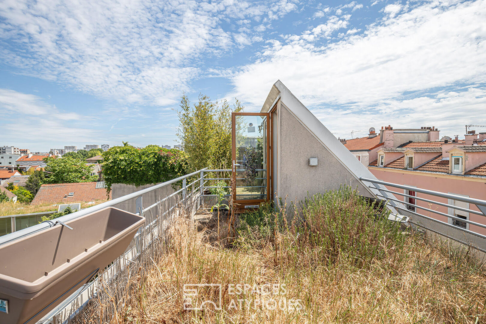 Triplex avec toit terrasse