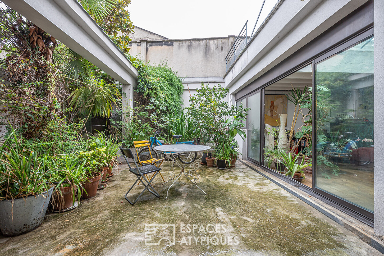 Loft avec verrière et patio