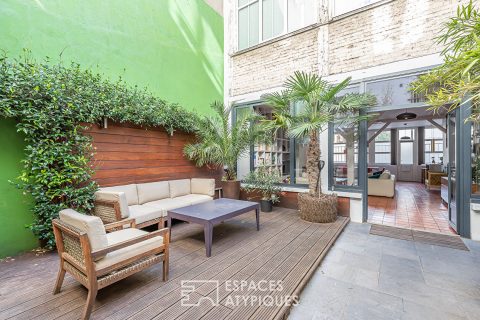 Loft with private courtyard in a former printing house