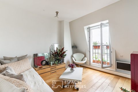 Dernier étage d’architecte épuré avec balconnets