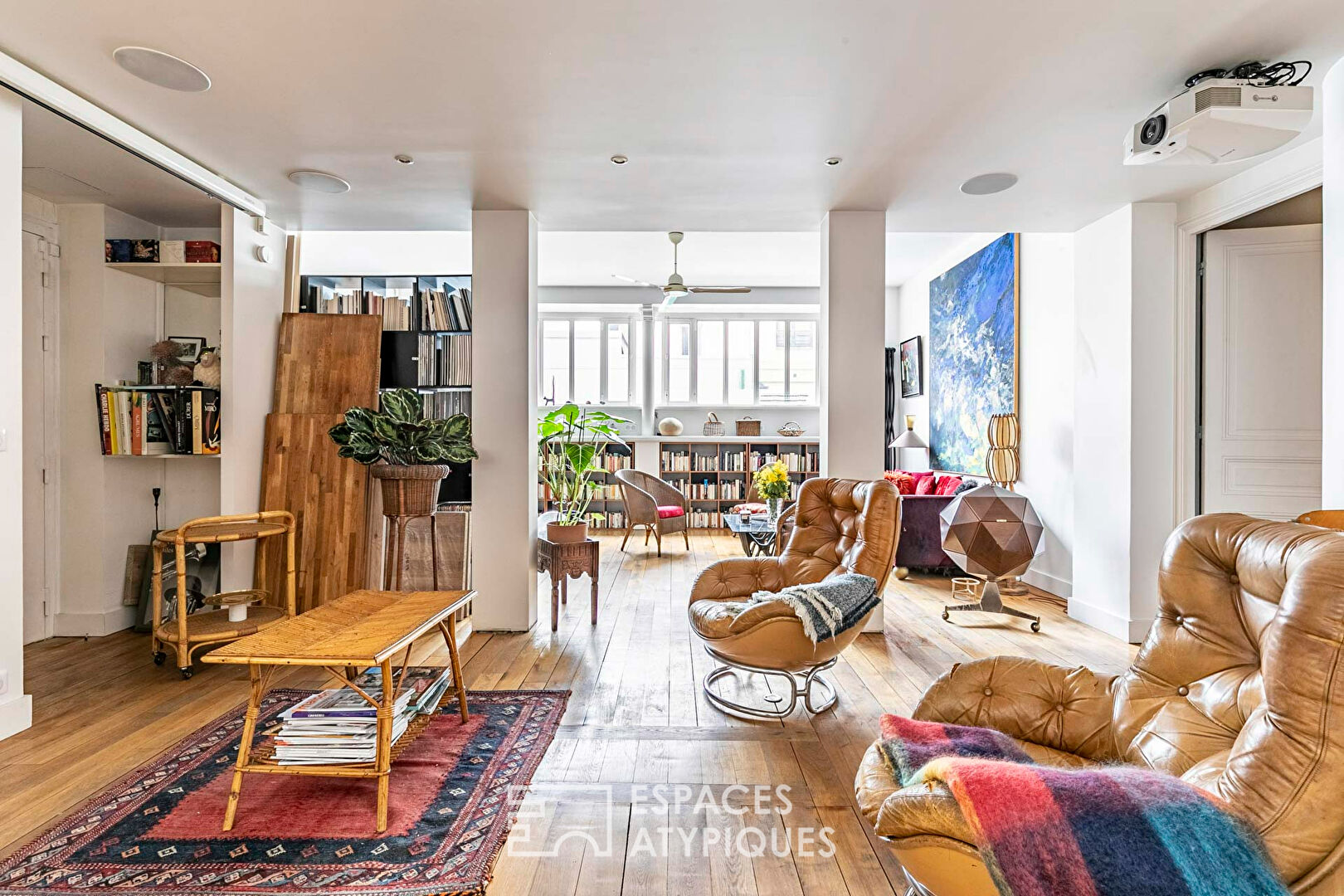 Loft traversant dans un ancien atelier de mosaïste