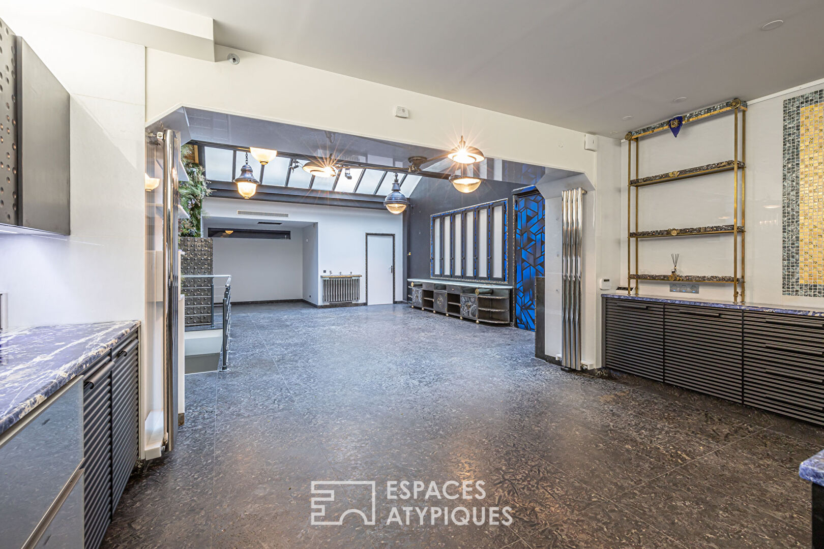 Loft avec verrière sur cour à Montorgueil