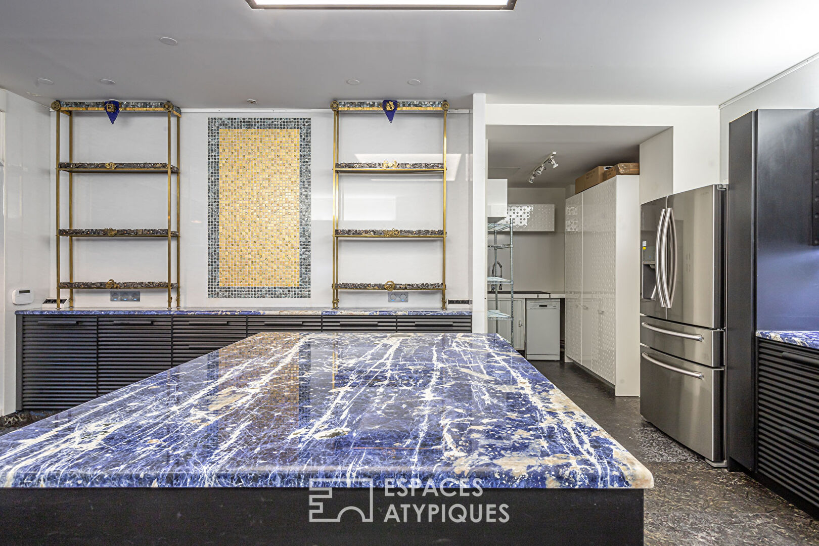 Loft avec verrière sur cour à Montorgueil