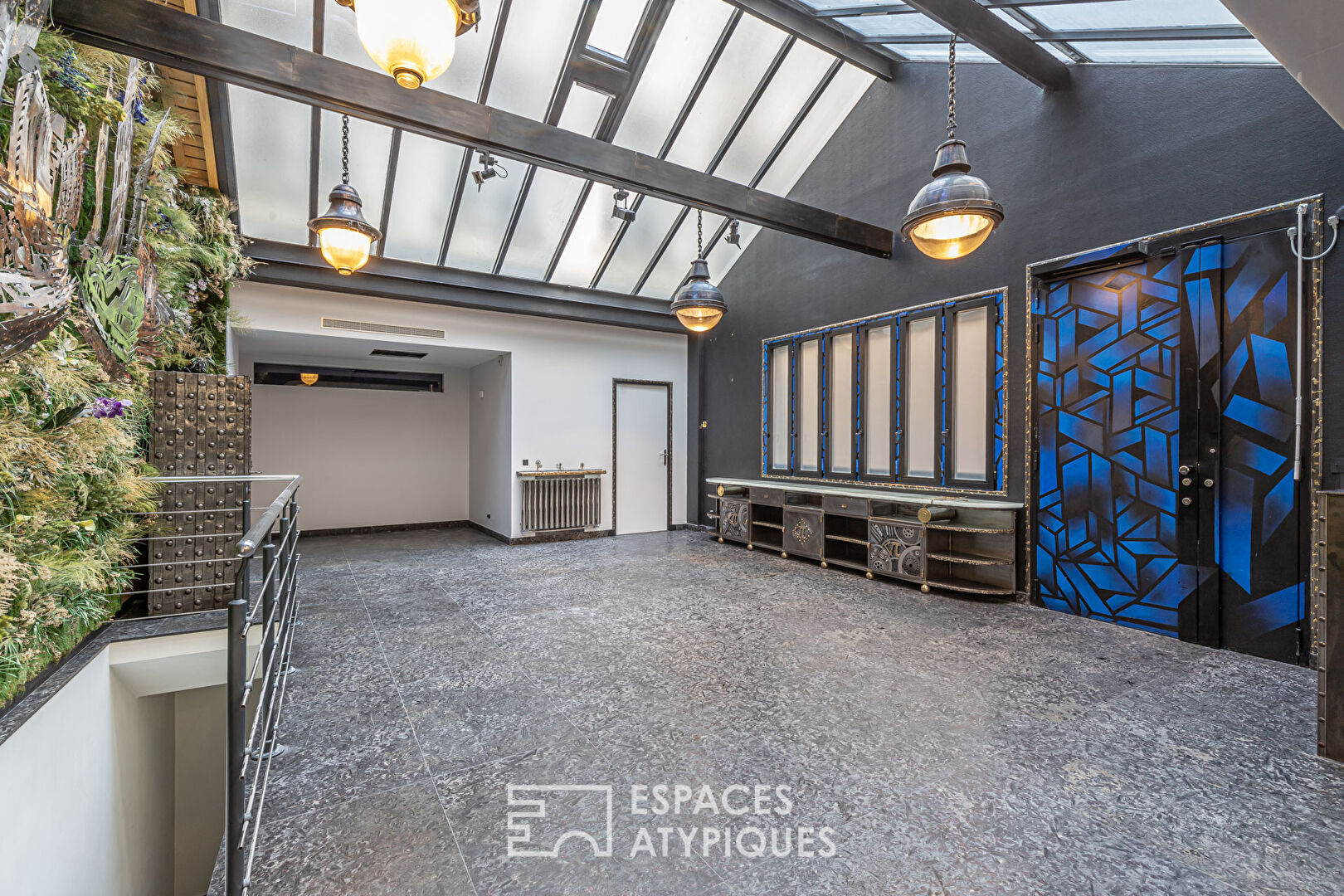 Loft avec verrière sur cour à Montorgueil