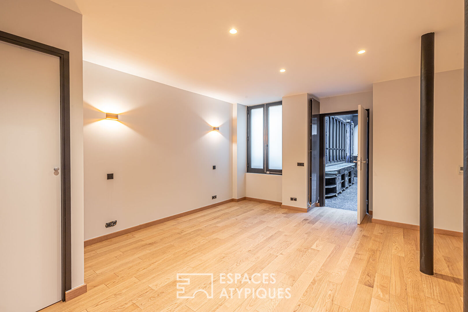 Loft avec verrière sur cour à Montorgueil