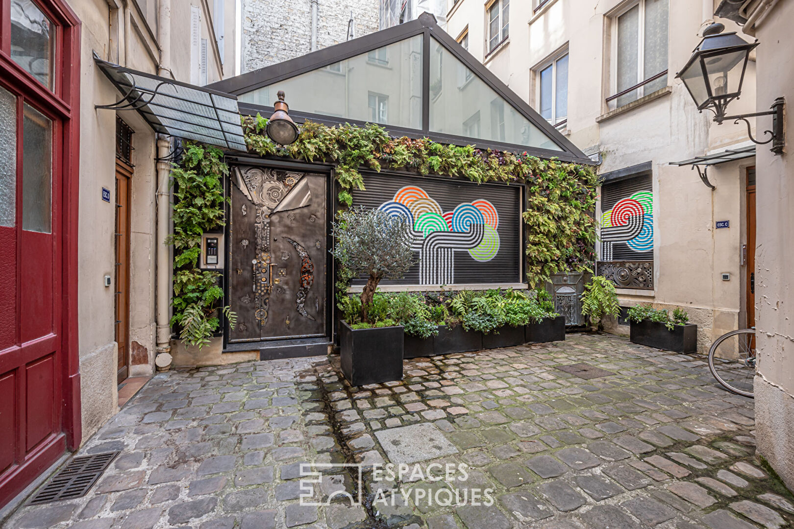 Loft avec verrière sur cour à Montorgueil