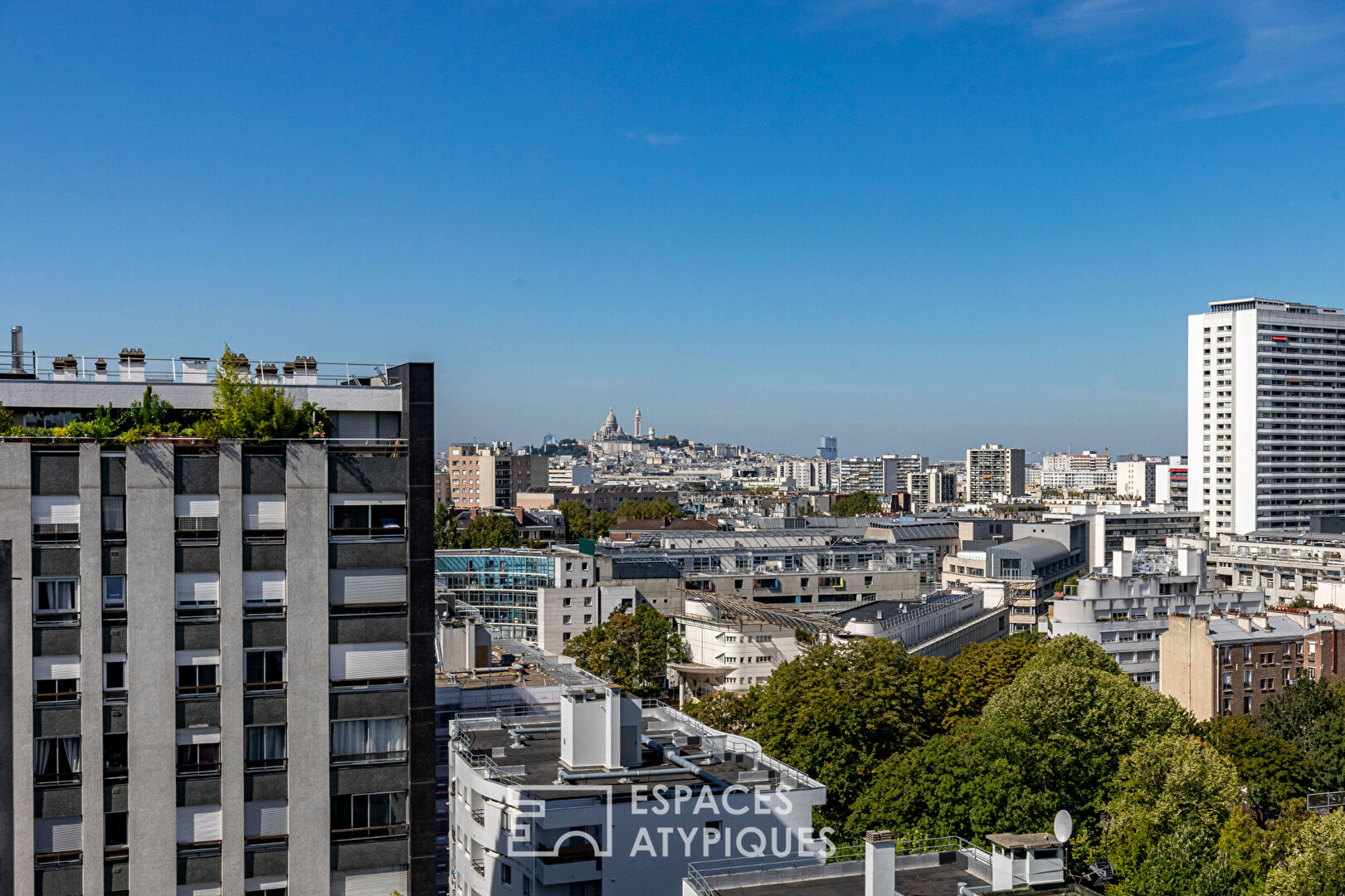 Dernier étage avec véranda et vue sur le Sacré Coeur