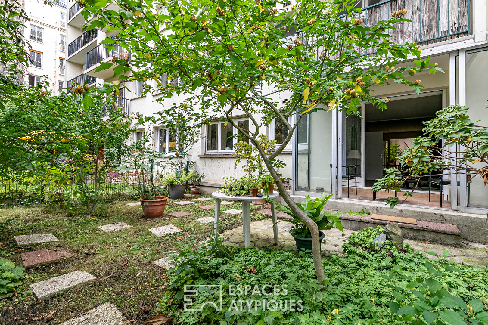 Appartement avec véranda et jardin privatif